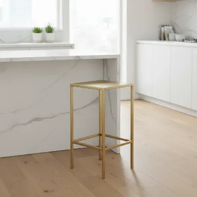 CB2 Flint Gold Bar Stool showcasing its sleek dimensions and compact design suitable for modern bars.