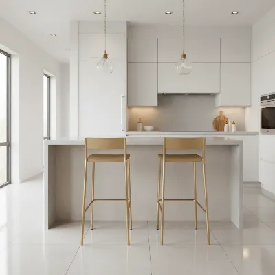 CB2 Flint Gold Bar Stools integrated into a stylish modern kitchen with a minimalist aesthetic.