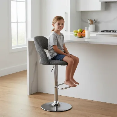 Child comfortably testing an adjustable height bar stool at a kitchen counter